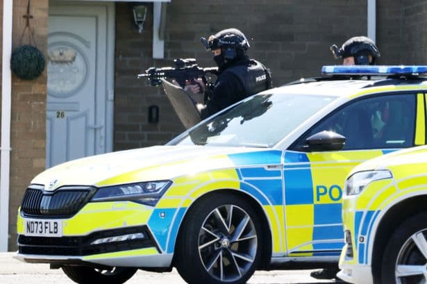 Gunman threatens to shoot officers in head during tense stand-off with armed police