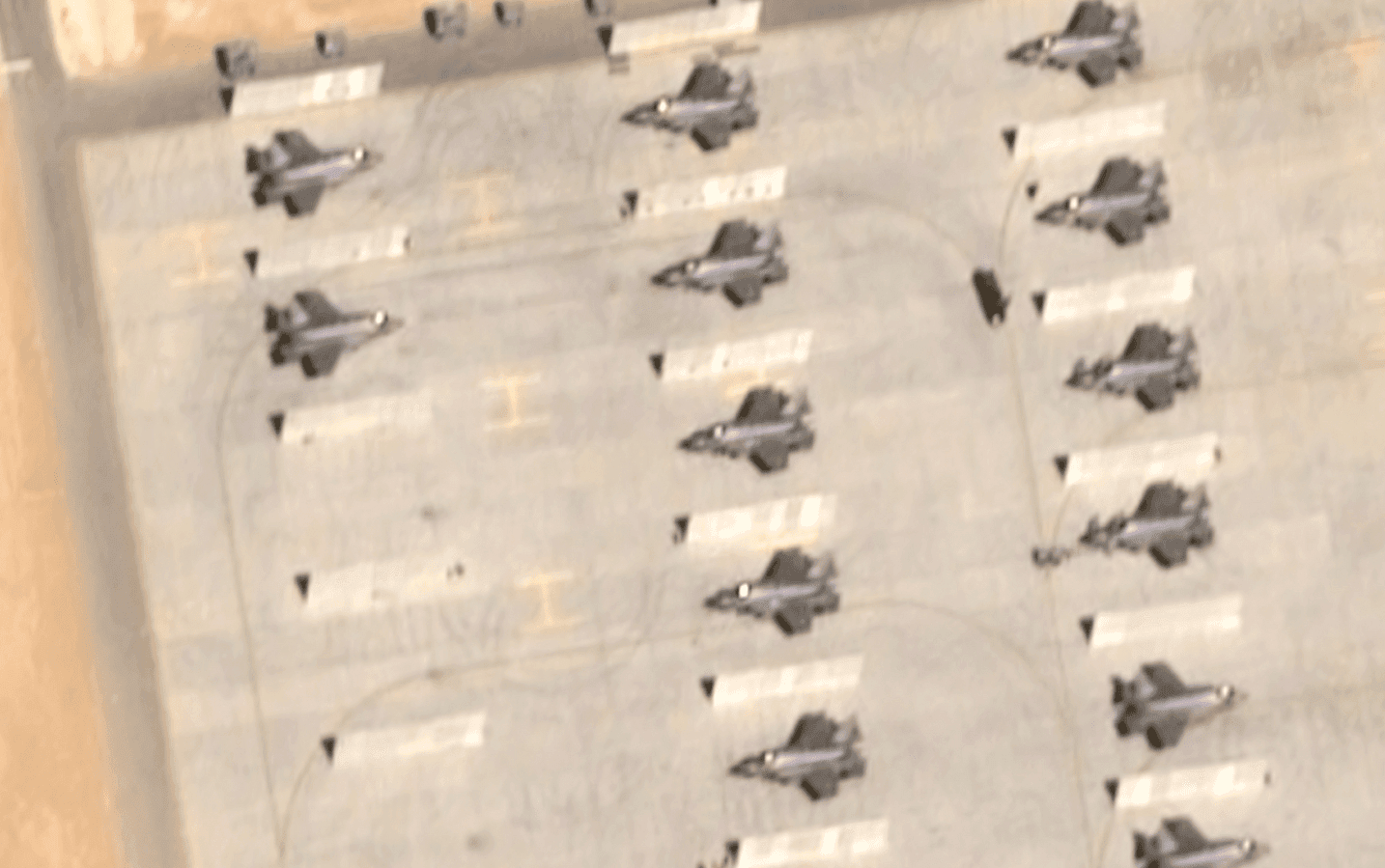 Clearest sign yet of imminent Trump strike on Iran as new satellite pics show more than 60 US military jets at key base