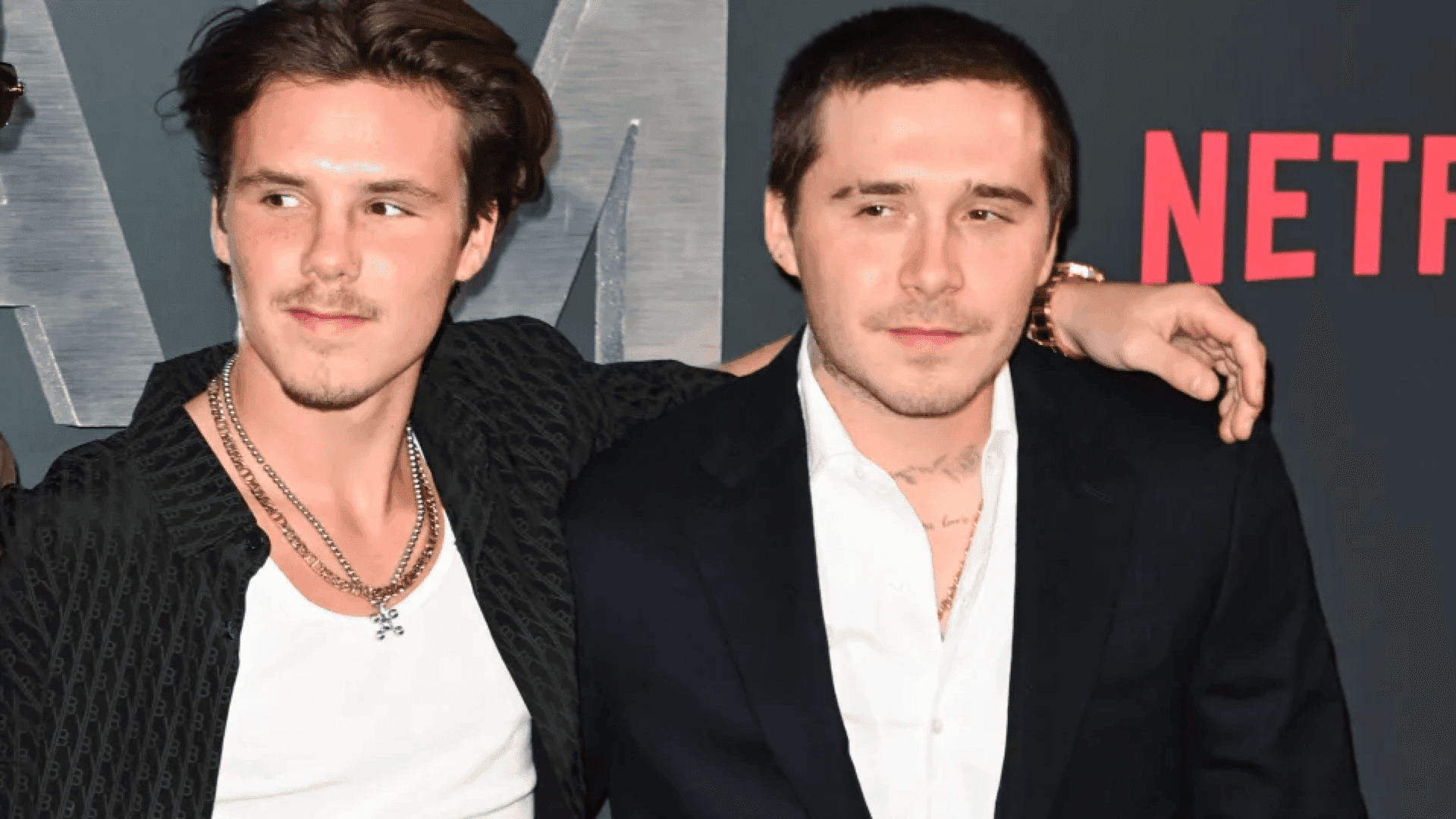 Brooklyn Beckham shows off VERY faded tattoo tribute to brother Cruz as he removes inking after bitter family fall out